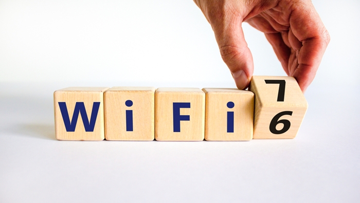 What’s next for Wi-Fi_.jpeg person measure man table holding wearing woman young