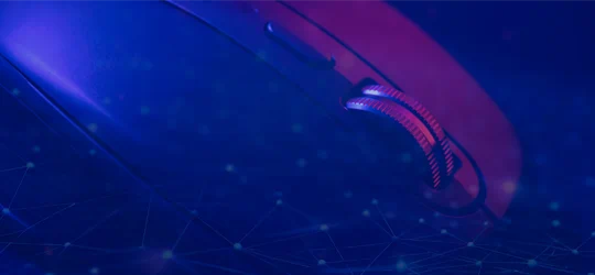 computer sitting keyboard laptop blue light mouse table holding standing man