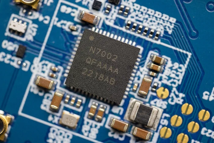 nRF7002 QFN48 6x6 on PCB_1.jpg a circuit board