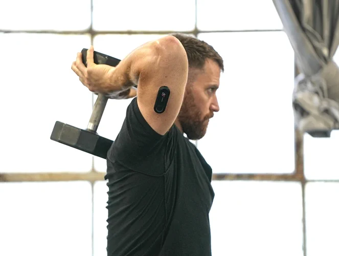 a man standing in front of a window
