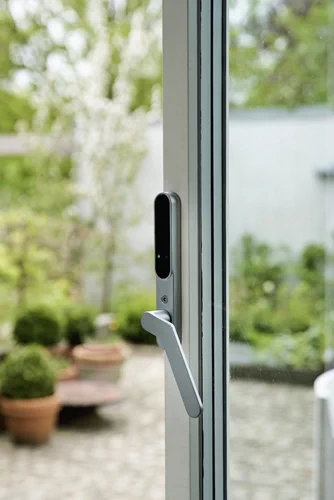 building sitting window parking meter fence glass door table street kitchen standing