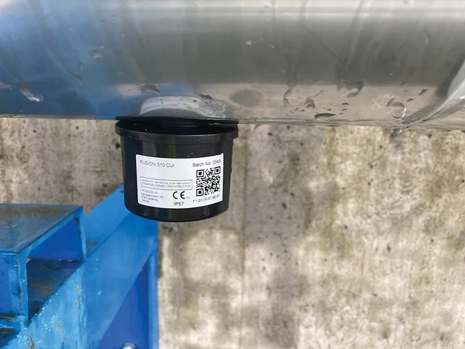 building sitting plane snow old covered blue parking kitchen ramp parked man air riding meter