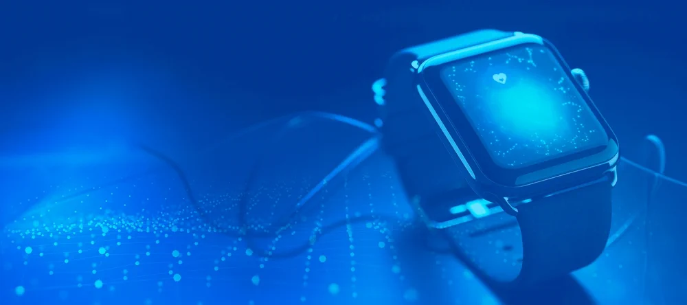 Wearables_Landing_pages.jpg table cellphone indoor sitting phone computer light keyboard laptop surface mouse monitor blue lit desk device water screen remote traffic game video player